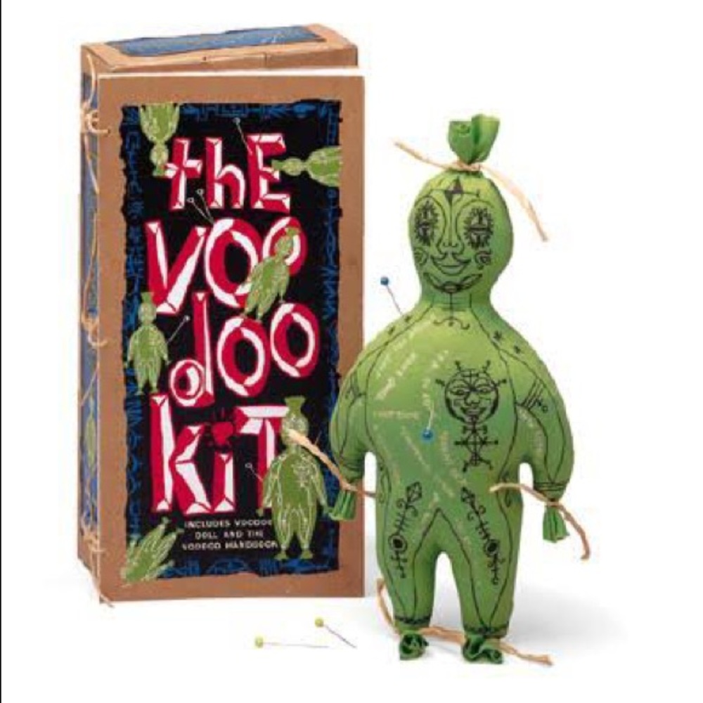 The Voodoo Kit : Voodoo doll and handbook.  Still sealed!  Very rare!